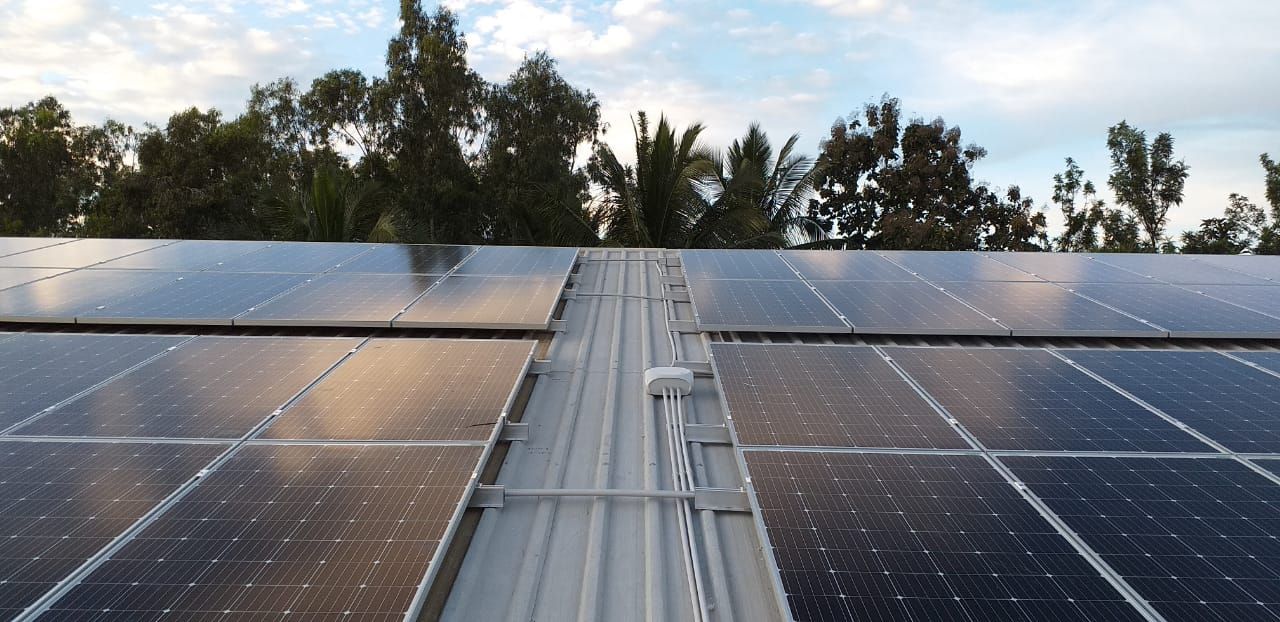 Installed solar modules running along the roof ridge